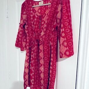 Beautiful red dress designed by an Israel based female clothing designer in Cali